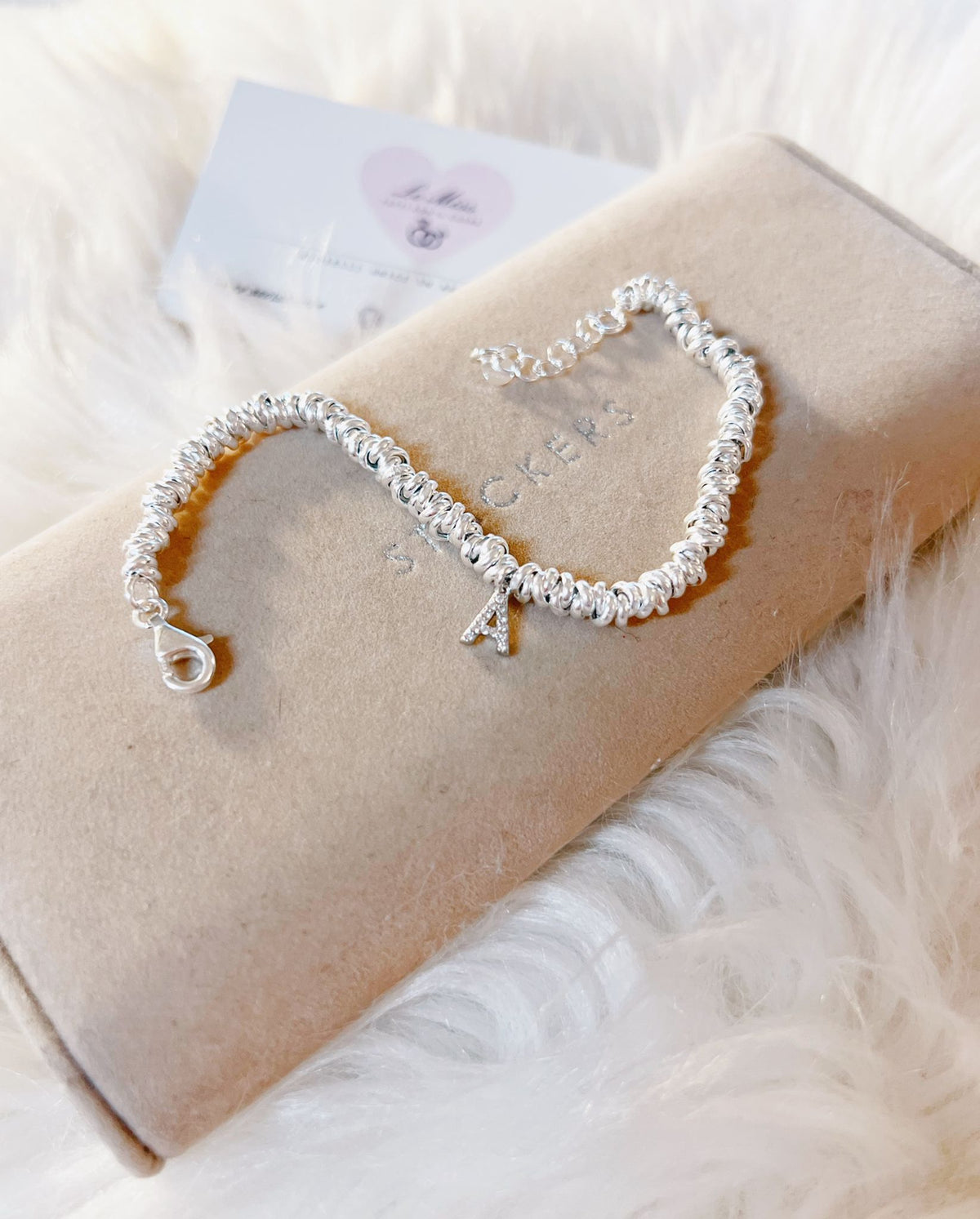 Bracciale nodini con lettera zirconi