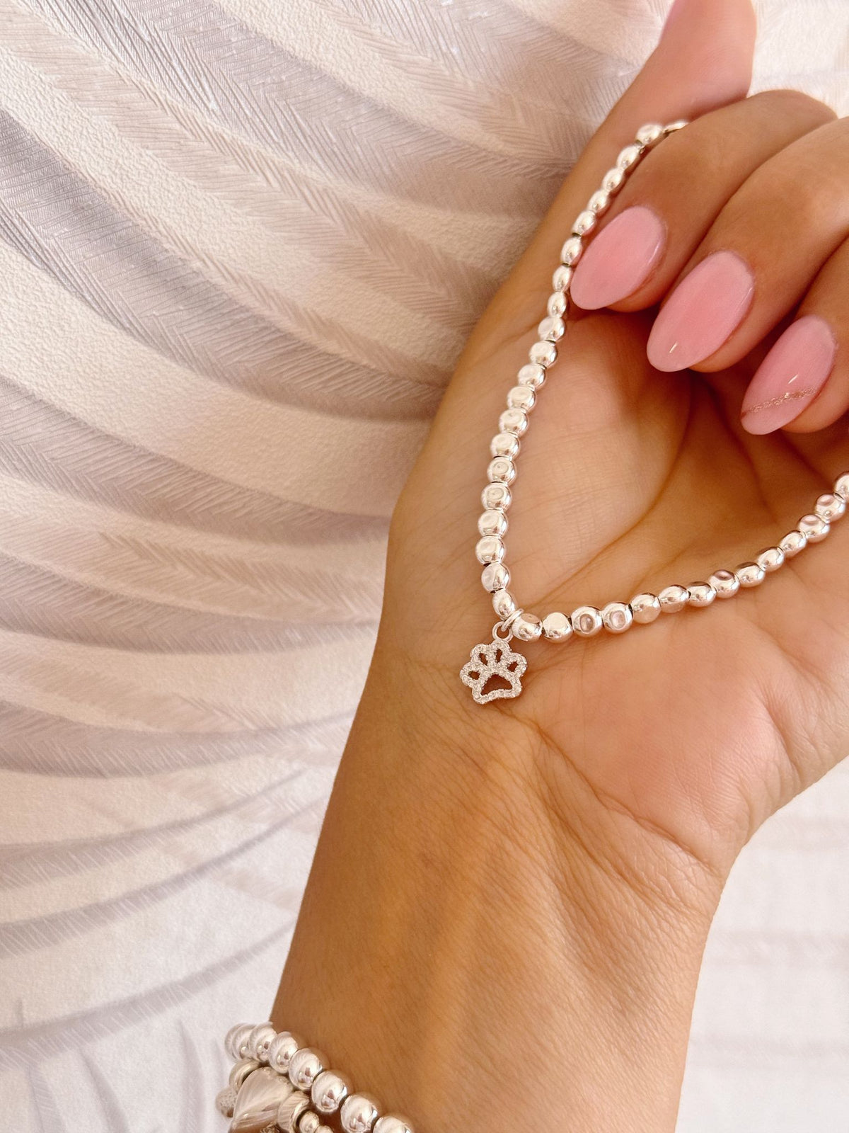 Bracciali dadini con zampa