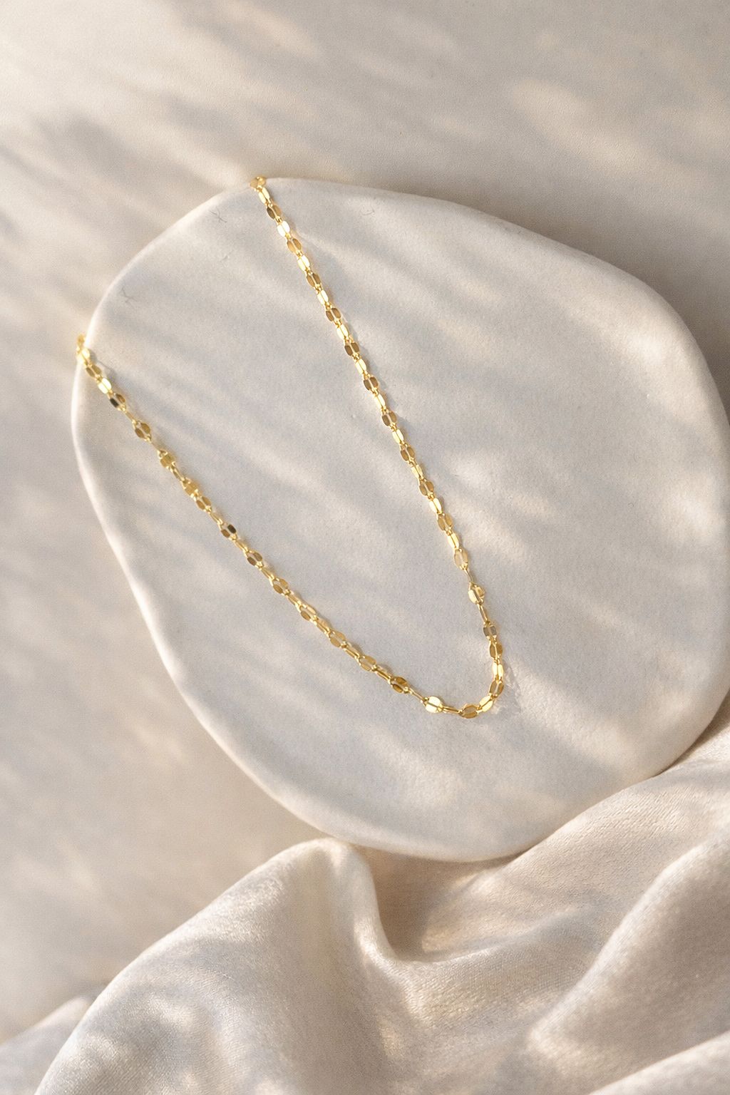 Girocollo squamette luce